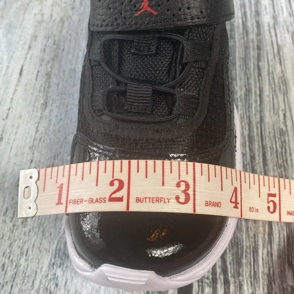 Kids Jordan 11 CMFT LOW Black Sneakers with Red Accents SIZE 8C